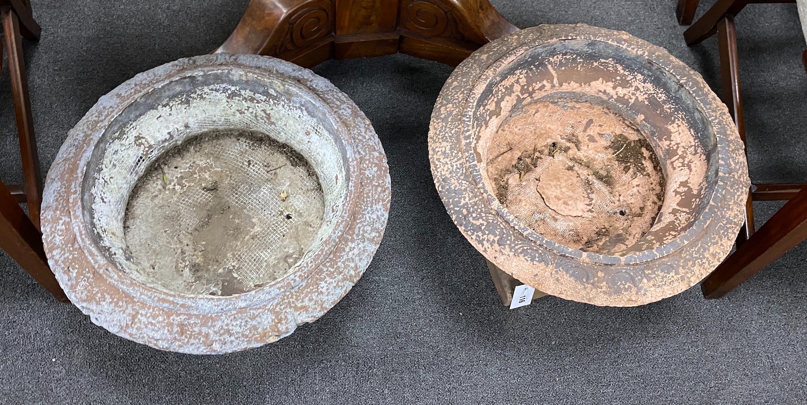 A pair of circular terracotta campana urns, diameter 44cm, height 29cm